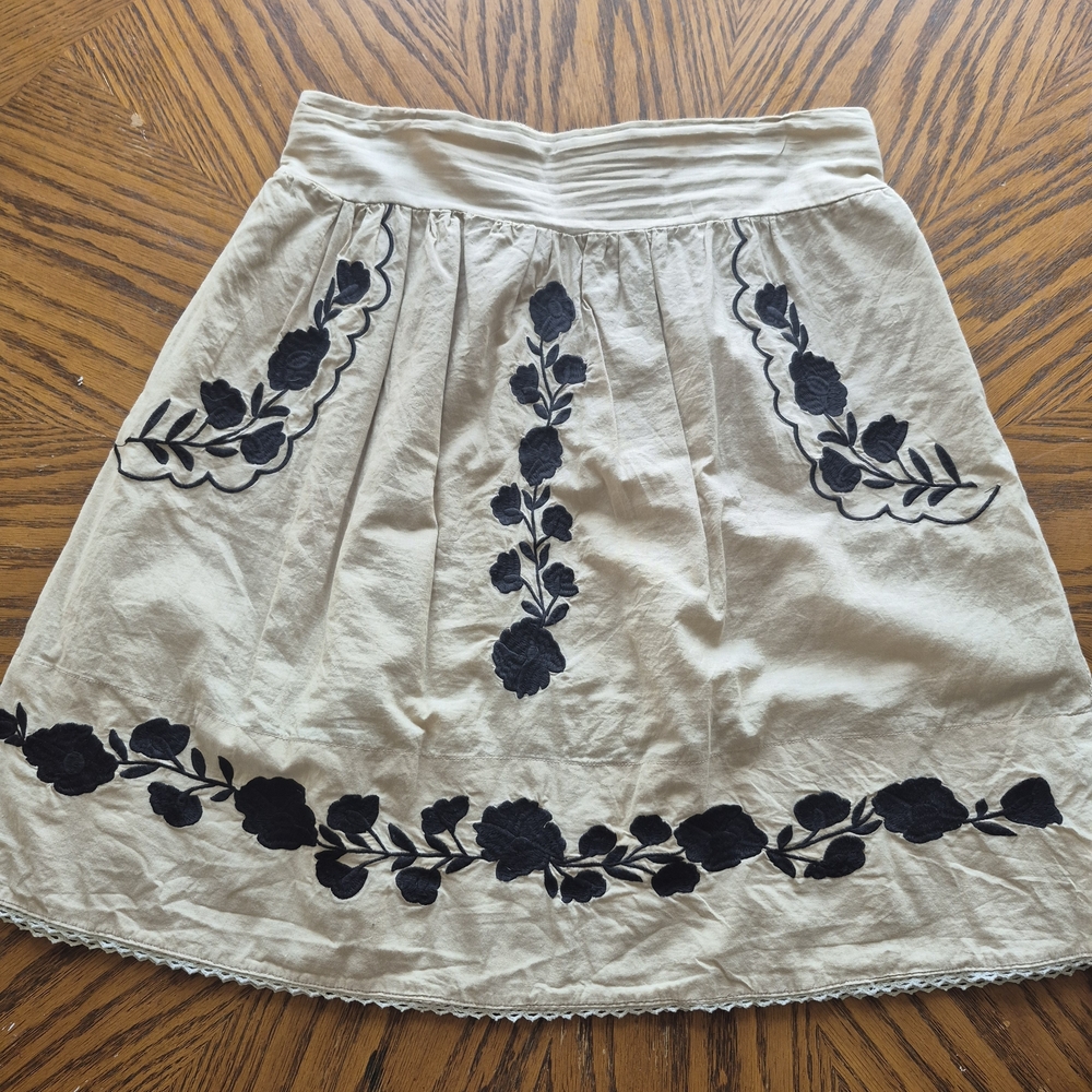 Solitaire Cream Skirt with Black Floral Design